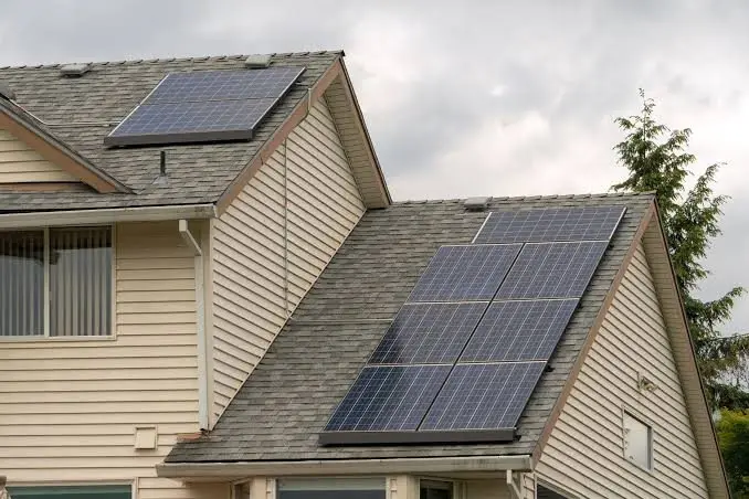 Solar panels on the roof of a two-story home